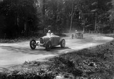 TP Cholmondeley-Tapper's Bugatti Type 37A leading a Frazer-Nash TT replica at Donington Park, 1930s. Artist: Bill Brunell