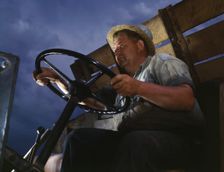 Truck driver at TVA's Douglas Dam, Tennessee, 1942. Creator: Alfred T Palmer