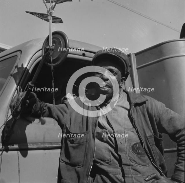 Truck drivers for the Alaska Coal Company, Washington, D.C., 1942. Creator: Gordon Parks.