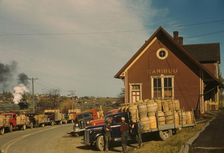 Trucks outside of a starch factory, Caribou, Aroostook County, Maine. , 1940. Creator: Jack Delano
