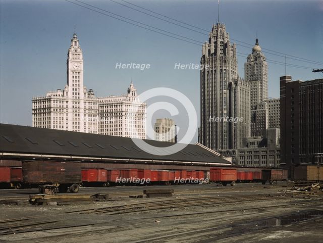 Trucks unloading at the inbound freight house of the Illinois Central Railroad...Chicago, Ill., 1943 Creator: Jack Delano.