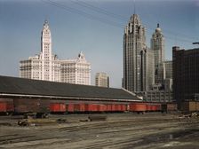 Trucks unloading at the inbound freight house of the Illinois Central Railroad...Chicago, Ill., 1943 Creator: Jack Delano