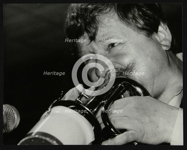 Trumpeter Janusz Carmello performing at The Fairway, Welwyn Garden City, Hertfordshire, 1991. Artist: Denis Williams