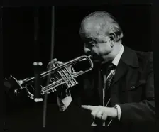 Trumpeter Kenny Baker playing at the Forum Theatre, Hatfield, Hertfordshire, 1978. Creator: Denis Williams