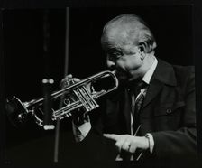 Trumpeter Kenny Baker playing at the Forum Theatre, Hatfield, Hertfordshire, 1978. Creator: Denis Williams