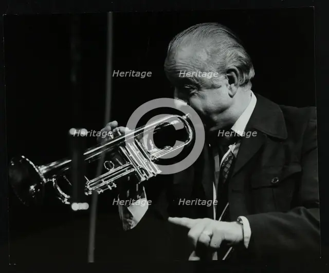 Trumpeter Kenny Baker playing at the Forum Theatre, Hatfield, Hertfordshire, 1978. Creator: Denis Williams.