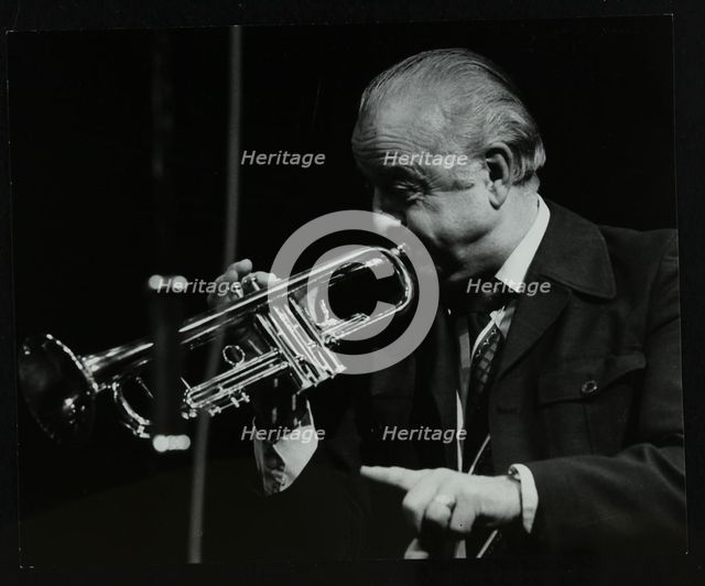 Trumpeter Kenny Baker playing at the Forum Theatre, Hatfield, Hertfordshire, 1978. Creator: Denis Williams.