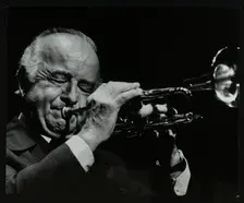 Trumpeter Kenny Baker playing at the Forum Theatre, Hatfield, Hertfordshire, 1978. Creator: Denis Williams