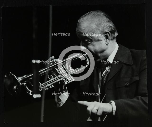 Trumpeter Kenny Baker playing at the Forum Theatre, Hatfield, Hertfordshire, 1978. Artist: Denis Williams