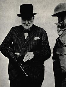 Trying Out a Tommy-Gun 1940, (1945). Creator: Unknown