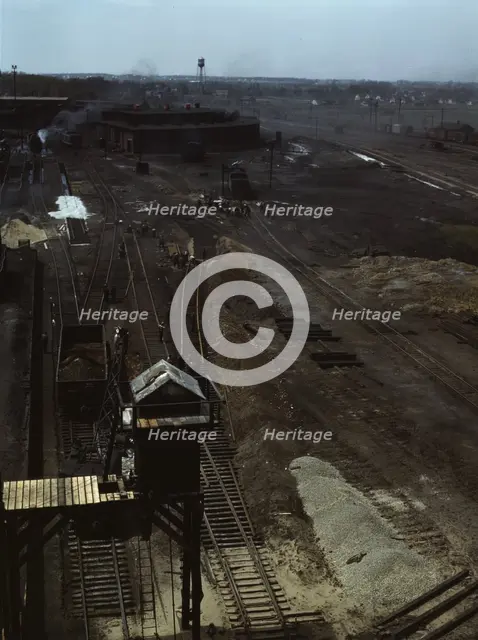Track repair work at the Bensenville yard of the Chicago, Milwaukee..., Illinois, 1943. Creator: Jack Delano.