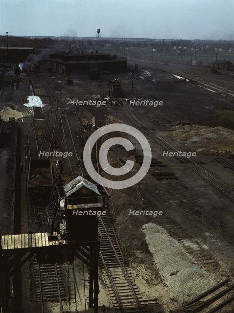 Track repair work at the Bensenville yard of the Chicago, Milwaukee..., Illinois, 1943. Creator: Jack Delano.