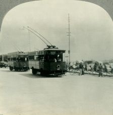Trackless Tram Cars in Singapore, Straits Settlement, British Malaya c1930s. Creator: Unknown