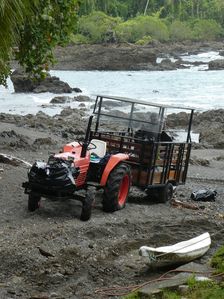 Tractor for transporting tourista and luggage from river arrival at hotel, Costa Rica 2018. Creator: Unknown