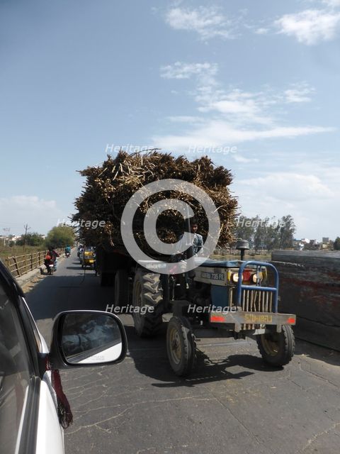 Tractor loaded with sugar cane, Uttarakhand, India. Creator: Unknown.