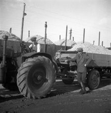 Tractors and loaded trailers at the sugar mill in Arlöv, Scania, Sweden, c1940s(?). Artist: Otto Ohm
