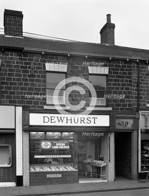 Traditional butcher's shop in the South Yorkshire town of Mexborough, 1962. Creator: Michael Walters.