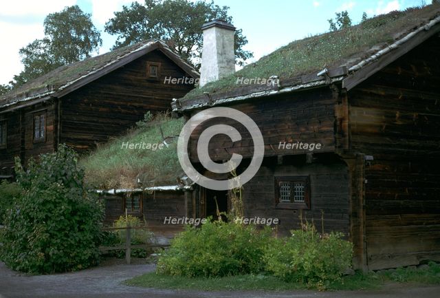 Traditional Swedish farm building with a turf roof. Artist: Unknown