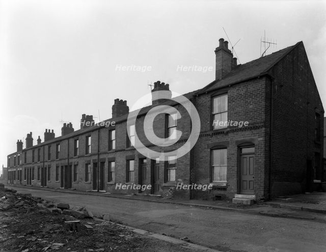 Traditional terraced housing, Albert Road, Kilnhurst, South Yorkshire, 1959. Creator: Michael Walters.