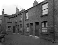 Traditional terraced housing, Albert Road, Kilnhurst, South Yorkshire, 1959. Creator: Michael Walters