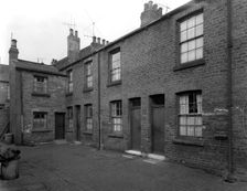 Traditional terraced housing, Albert Road, Kilnhurst, South Yorkshire, 1959. Creator: Michael Walters