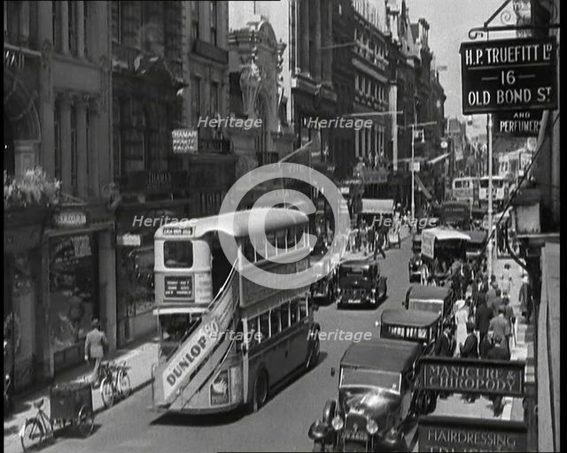 Traffic and Crowds Moving Through Old Bond Street, 1930s. Creator: British Pathe Ltd.