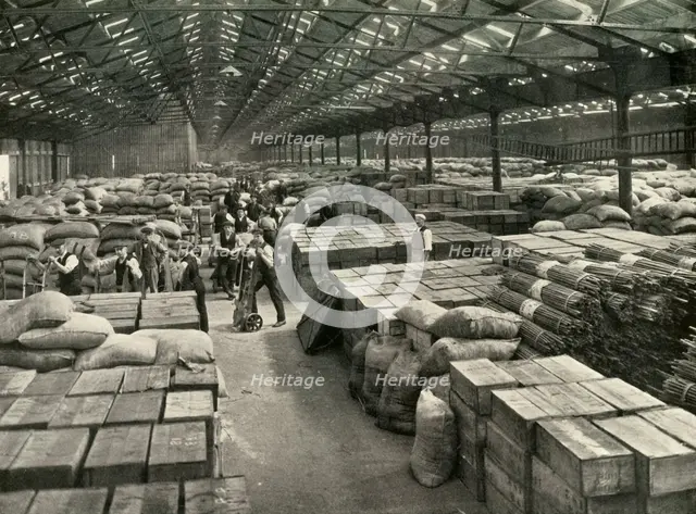 "Traffic and Merchandise Multiplied Century By Century" A Dock Transit Shed', 1937. Creator: Unknown.