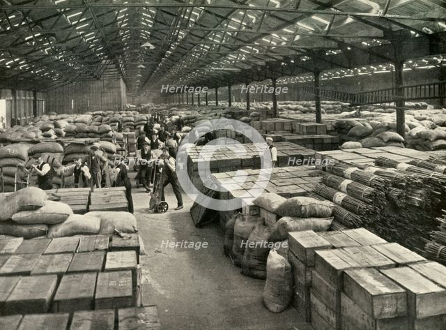 "Traffic and Merchandise Multiplied Century By Century" A Dock Transit Shed', 1937. Creator: Unknown.