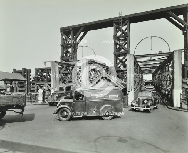 Traffic driving on to the Woolwich Ferry, London, 1945. Artist: Unknown.