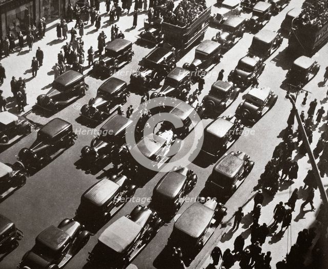 Traffic jam on Fifth Avenue at 49th Street, New York, USA, early 1929. Creator: Unknown.