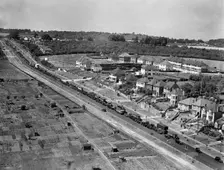 Traffic jam on the outskirts of Rochester, Kent, 1938. Artist: Aeropictorial Ltd