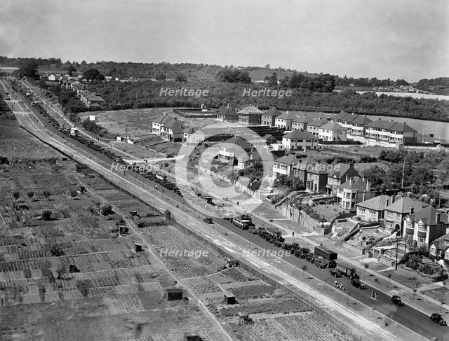 Traffic jam on the outskirts of Rochester, Kent, 1938. Artist: Aeropictorial Ltd.
