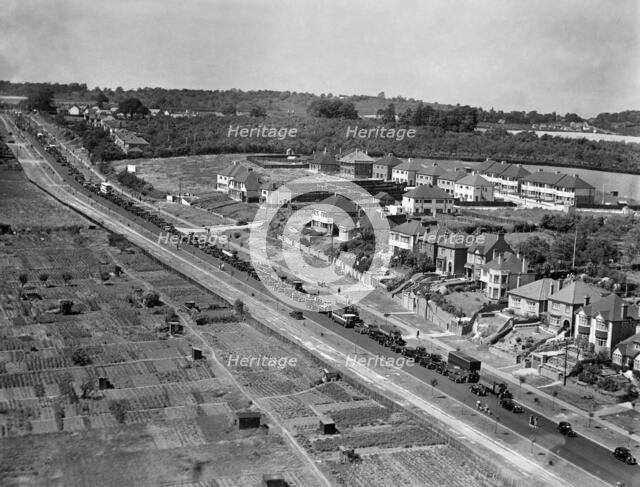 Traffic jam on the outskirts of Rochester, Kent, 1938. Artist: Aeropictorial Ltd.