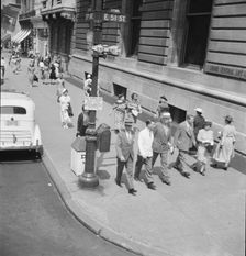 Traffic on Fifth Avenue approaching 57th Street on a summer afternoon, New York City, 1939 Creator: Dorothea Lange