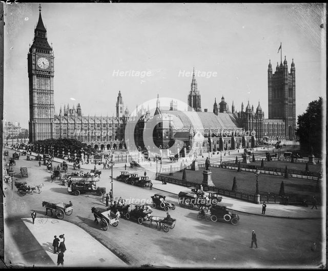 Traffic passing the Palace of Westminster on Parliament Street and Parliament Square, 1900-15.  Creator: JJ Samuels Limited.