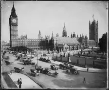 Traffic passing the Palace of Westminster on Parliament Street and Parliament Square, 1900-15. Creator: JJ Samuels Limited