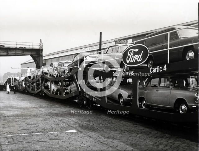 Train carrying cars of the Ford trademark, 1950.