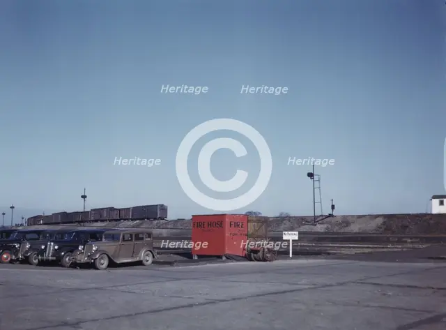Train going over the hump at C & NW RR's Proviso yard, Chicago, Ill., 1942. Creator: Jack Delano.