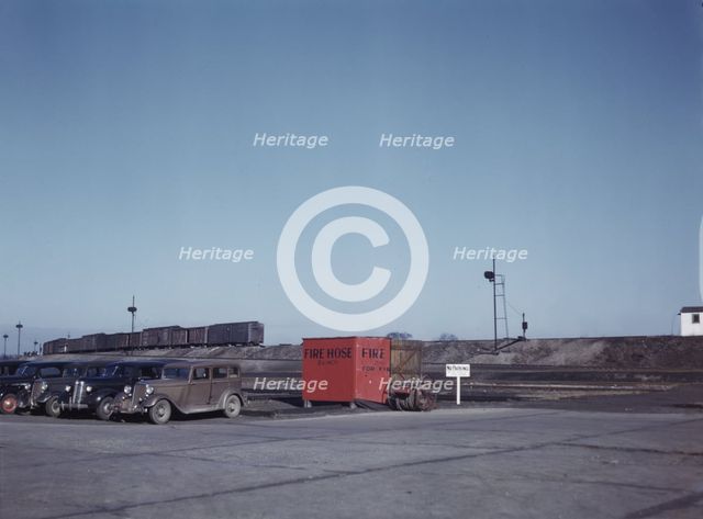 Train going over the hump at C & NW RR's Proviso yard, Chicago, Ill., 1942. Creator: Jack Delano.