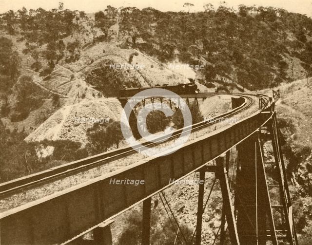 'Train Passing Over Viaduct, Mount Lofty Range, South Australia', 1930. Creator: Unknown.