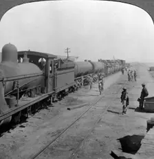 Trainload of armoured cars, South West Africa, World War I, 1914-1918.Artist: Realistic Travels Publishers