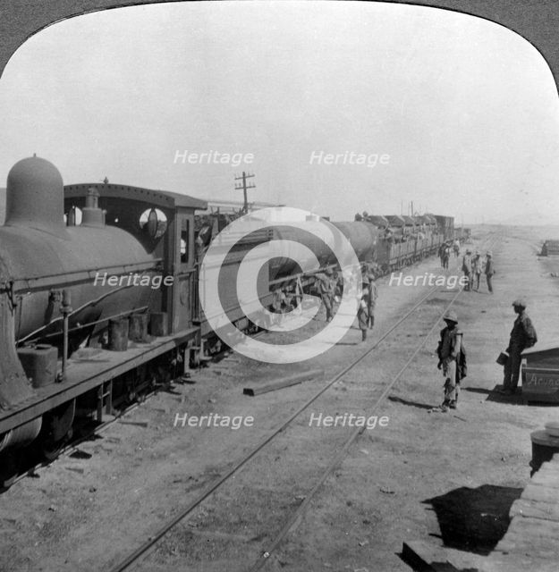 Trainload of armoured cars, South West Africa, World War I, 1914-1918.Artist: Realistic Travels Publishers