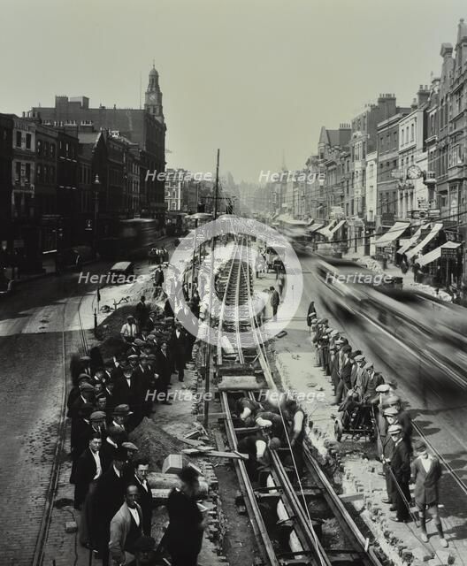 Tramline being laid in the middle of the road, Whitechapel High Street, London, 1929. Artist: Unknown.
