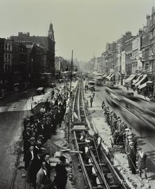 Tramline being laid in the middle of the road, Whitechapel High Street, London, 1929