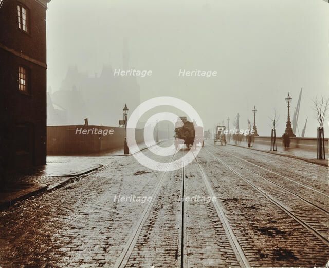 Tramlines and vehicles on the Albert Embankment, Lambeth, London, 1909. Artist: Unknown.