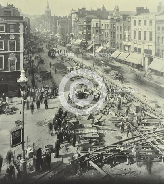 Tramlines being laid, Whitechapel High Street, London, 1929. Artist: Unknown.