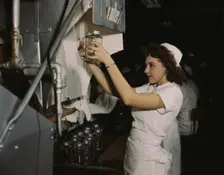 Transfusion donor bottles, Baxter Lab., Glenview, Ill., 1942. Creator: Howard Hollem