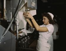 Transfusion donor bottles, Baxter Lab., Glenview, Ill., 1942. Creator: Howard Hollem