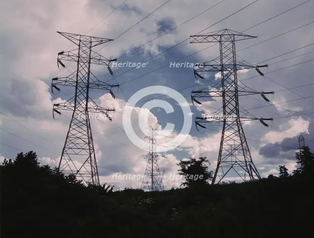 Transmission line towers and high tension lines that......Wilson Dam..., near Sheffield, Ala., 1942. Creator: Alfred T Palmer.