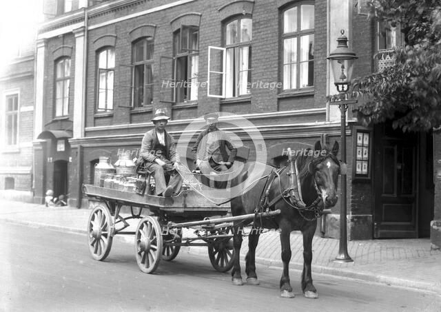 Transporting milk by horse and cart, Landskrona, Sweden, 1915. Artist: Unknown